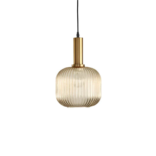 Vintage ribbed glass pendant light, bottle shape in amber with gold handle, product view