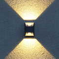 Elion outdoor wall light, warm beams on rough grey stucco