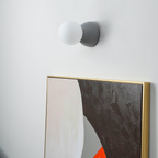 Circle of Light Travertine Cement Wall Light