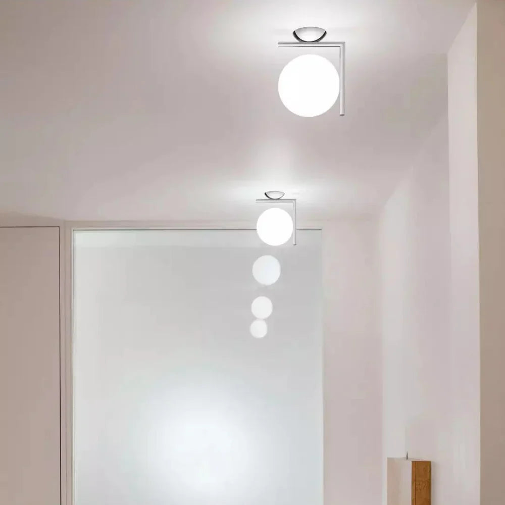 Calla Hanging Glass Globe Nordic Brass Wall Light