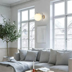 Calla Hanging Glass Globe Nordic Brass Wall Light