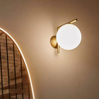 Calla Hanging Glass Globe Nordic Brass Wall Light
