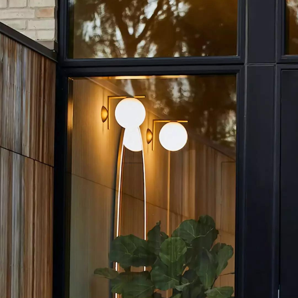 Calla Hanging Glass Globe Nordic Brass Wall Light