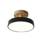 Luminous Charm minimalist ceiling light, black drum with a wooden canopy, product view