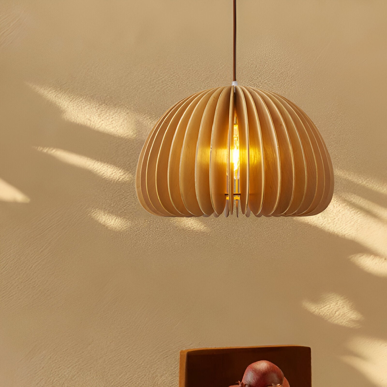 The Wood Pumpkin Sparkle Pendant Light