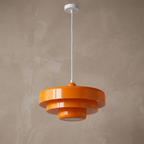 Retro Norwegian Acrylic Pendant Light lifestyle image - Higgsfield lux20v1 - a2