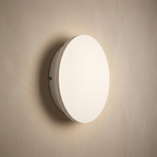 Modern Nordic Round Aluminum Minimalist LED Wall Light lifestyle image - Higgsfield lux20v1 - a2