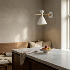 NordicGlow - Simple Nordic wall lamp with horn shade lifestyle image - Higgsfield lux20v1 - a10
