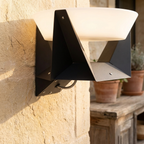 Illuminated Landing Modern Solar Iron Outdoor Lamp lifestyle image - Higgsfield lux20v1 - a4