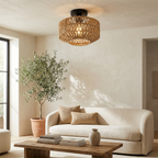 Woven Lantern Boho Radiance Rattan Ceiling Light lifestyle image - Higgsfield lux20v1 - a19