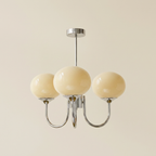 Marshmallow Modern Glass Chandelier lifestyle image - Higgsfield lux20v1 - a1