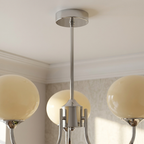 Marshmallow Modern Glass Chandelier lifestyle image - Higgsfield lux20v1 - a4