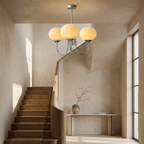 Marshmallow Modern Glass Chandelier lifestyle image - Higgsfield lux20v1 - a11