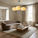 Marshmallow Modern Glass Chandelier lifestyle image - Higgsfield lux20v1 - a14