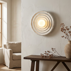 Wabi-Sabi Resin Round Circle Wall Light lifestyle image - Higgsfield lux20v1 - a19