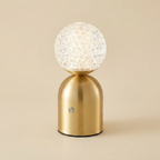 Emerald Veil Elegance Wireless Table Lamp lifestyle image - Higgsfield lux20v1 - a1