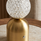 Emerald Veil Elegance Wireless Table Lamp lifestyle image - Higgsfield lux20v1 - a3