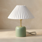 Tide Burst Ceramic Table Lamp with Fabric Shade lifestyle image - Higgsfield lux20v1 - a2