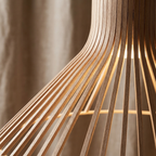 The Wood Sacred Radiance Pendant Light lifestyle image - Higgsfield lux20v1 - a3
