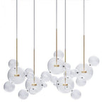 Aura glass bubble pendant light, five rods in a row with a wide spread of spheres