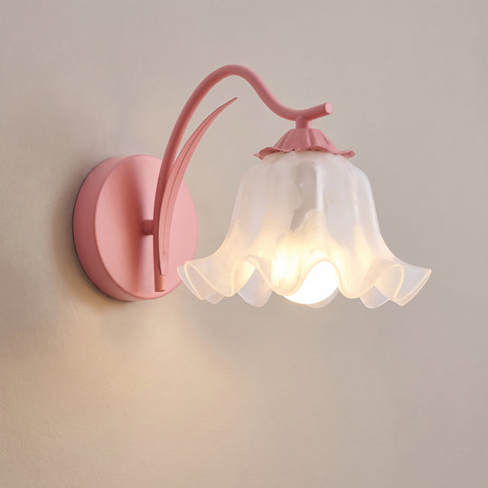 French Flower wall sconce, pink version, studio shot on a neutral backdrop