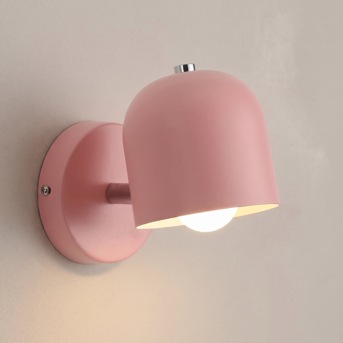 Macaron modern wall sconce, studio shot on a neutral backdrop