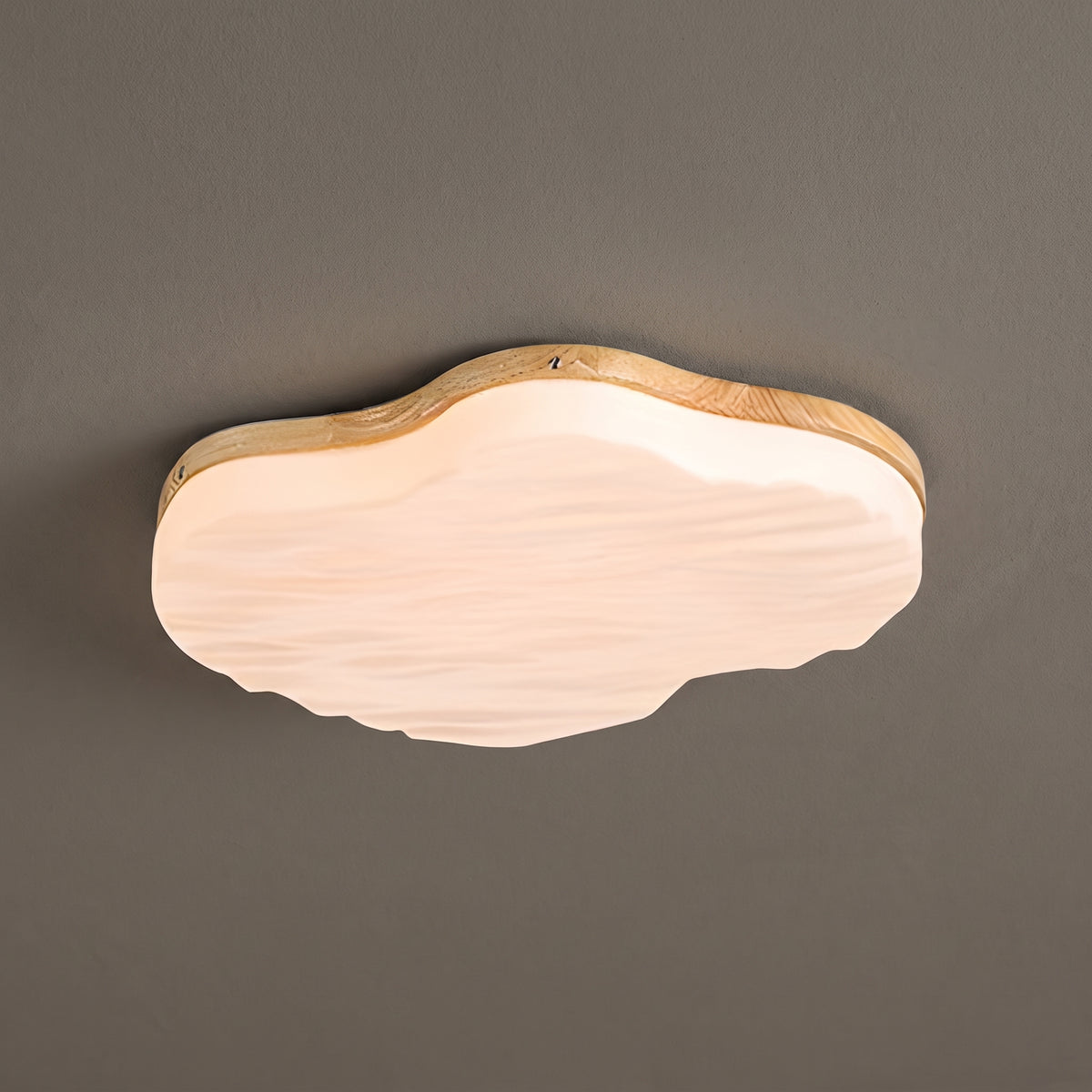 Wood grain cloud ceiling light, pale timber rim, studio shot on a neutral backdrop