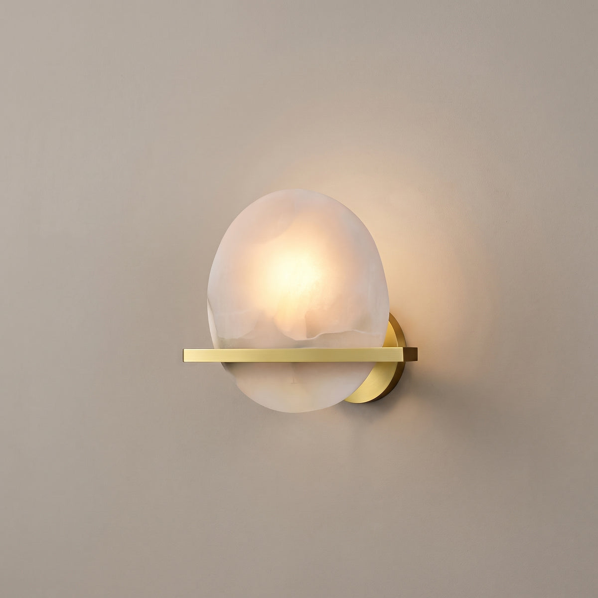 Spanish Marble Chip wall sconce, studio shot on a neutral backdrop