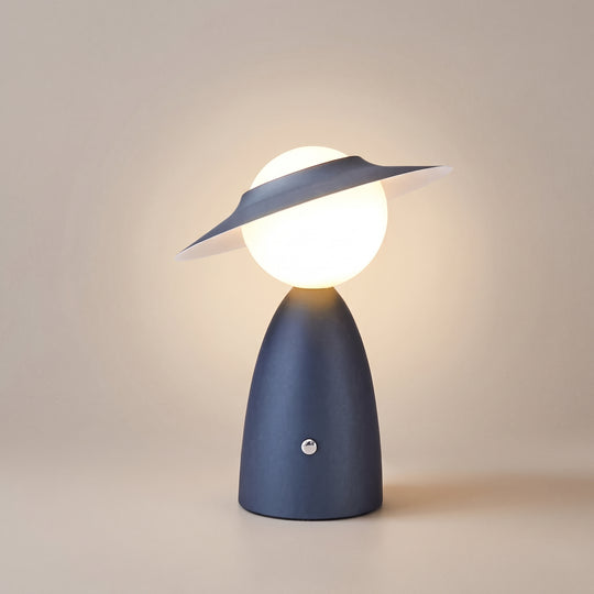 TouchBright modern table lamp, blue, wide-brim shade over a round globe, studio shot on a neutral backdrop